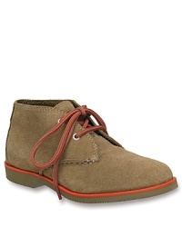 A mid-rise desert boot is updated with tonal topstitching, bold trim along the welt and a luxe suede upper. A mid-rise desert boot is updated with tonal topstitching, bold trim along the welt and a luxe suede upper.