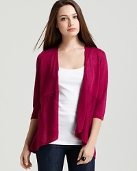 A refreshing dash of color for your everyday wardrobe, this Eileen Fisher Petites cardigan pairs a delicious hue with delicate ruffles for the perfect feminine touch. A refreshing dash of color for your everyday wardrobe, this Eileen Fisher Petites cardigan pairs a delicious hue with delicate ruffles for the perfect feminine touch.