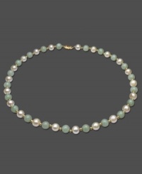 Look pretty in elegant pastels. This gorgeous necklace features cultured freshwater pearl (8 - 8-1/2 mm) and jade (8 mm) set in 14k gold. Approximate length: 18 inches. Look pretty in elegant pastels. This gorgeous necklace features cultured freshwater pearl (8 - 8-1/2 mm) and jade (8 mm) set in 14k gold. Approximate length: 18 inches.