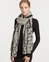 An ultra-soft, ultra-luxe cashmere design is adorned with a large tree print.Cashmere24 X 74Dry cleanImported