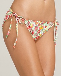 A whimsical floral print feels decidedly tropical on this Lilly Pulitzer bikini bottom. A whimsical floral print feels decidedly tropical on this Lilly Pulitzer bikini bottom.