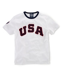 A sporty tee in soft breathable cotton is accented with heritage pride, celebrating Team USA's participation in the 2012 Olympics. Ribbed contrasting crew neckline. A sporty tee in soft breathable cotton is accented with heritage pride, celebrating Team USA's participation in the 2012 Olympics. Ribbed contrasting crew neckline.