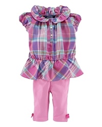 Sweet ruffles adorn a preppy madras tunic that is made complete with a matching legging for the perfect set. Sweet ruffles adorn a preppy madras tunic that is made complete with a matching legging for the perfect set.