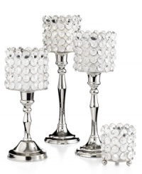 Romance a room. The warm glow of candlelight coupled with polished metal and rings of crystal make Leeber's Sparkle candlestick an eye-catching addition to the living room, bedroom or dining table. Romance a room. The warm glow of candlelight coupled with polished metal and rings of crystal make Leeber's Sparkle candlestick an eye-catching addition to the living room, bedroom or dining table.