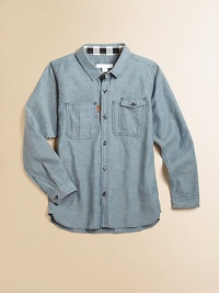 A slightly deconstructed take on a classic button-down with contrast stitching, patch pockets and leather logo.Shirt collarLong sleeves with button tabsButton-frontFront patch pocketsBack yokePleated backShirttail hem85% cotton/15% linenMachine washImported Please note: Number of buttons may vary depending on size ordered. A slightly deconstructed take on a classic button-down with contrast stitching, patch pockets and leather logo.Shirt collarLong sleeves with button tabsButton-frontFront patch pocketsBack yokePleated backShirttail hem85% cotton/15% linenMachine washImported Please note: Number of buttons may vary depending on size ordered.