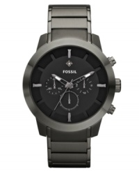 Daring in design, this gunmetal plated timepiece from Fossil rises above the pack with a single diamond accent. Daring in design, this gunmetal plated timepiece from Fossil rises above the pack with a single diamond accent.