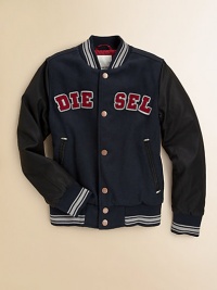 A classic letterman's jacket is embellished with logo appliqué and faux leather sleeves for back to school style.Ribbed collarLong sleeves with ribbed cuffsFull snap-frontSlash pocketsRibbed hemFully lined80% polyester/20% woolPolyurethane (faux leather) sleeves and pocket trimMachine washImported Please note: Number of snaps may vary depending on size ordered. A classic letterman's jacket is embellished with logo appliqué and faux leather sleeves for back to school style.Ribbed collarLong sleeves with ribbed cuffsFull snap-frontSlash pocketsRibbed hemFully lined80% polyester/20% woolPolyurethane (faux leather) sleeves and pocket trimMachine washImported Please note: Number of snaps may vary depending on size ordered.