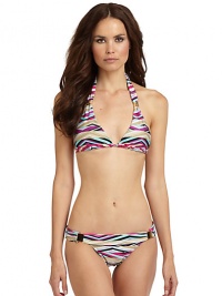 THE LOOKAllover geometric stripe patternAdjustable triangle cups with goldtone ornamentsTie closures in backTHE MATERIAL85% nylon/15% spandexFully linedCARE & ORIGINHand washImportedPlease note: Bikini bottom sold separately. THE LOOKAllover geometric stripe patternAdjustable triangle cups with goldtone ornamentsTie closures in backTHE MATERIAL85% nylon/15% spandexFully linedCARE & ORIGINHand washImportedPlease note: Bikini bottom sold separately.