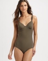 A swim style with bra sizing and comfy shapewear capabilities. It flattens the tummy, slims hips and flatters the rear. The adjustable, chain-link-detail straps and underwire cups offer additional support.Adjustable strapsBust-flattering, gathered details on underwire cupsFully lined72% nylon/28% spandexHand washImported