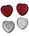 Mix and match to your heart's content. GUESS's dynamic earring duo features two pair of heart-shaped stud -- one in clear crystals and silver tone mixed metal, the other in red crystals and black plated mixed metal. Approximate diameter: 1/2 inch.