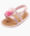 Indulge her girlie side with these adorable sandals from First Impressions.