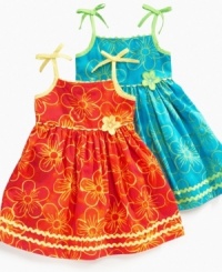 Wiggle room. Ribbons and flower accents are perfect touches for dancing and playing in this sundress from Blueberi Boulevard. Wiggle room. Ribbons and flower accents are perfect touches for dancing and playing in this sundress from Blueberi Boulevard.