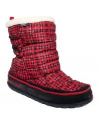Stay warm all winter long with the Radler Trail booties by Timberland. This plaid style features zipper and bungee accents along the back. Stay warm all winter long with the Radler Trail booties by Timberland. This plaid style features zipper and bungee accents along the back.