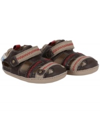 Strapped in and ready to go! He'll be up for anything in these stylish Robeez shoes designed for both comfort and muscle development. Strapped in and ready to go! He'll be up for anything in these stylish Robeez shoes designed for both comfort and muscle development.