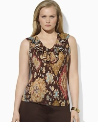 Rendered in light-as-air tissue cotton, a sleeveless top exudes rustic beauty with an earthy medallion pattern and chic ruffles at the neckline.