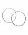 A style staple for every aspiring fashionista. Style&co.'s polished hoop earrings feature a silver tone mixed metal setting. Approximate diameter: 1-3/4 inches.