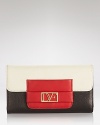 Color blocked mod colors make a bold statement on a continental wallet from DIANE von FURSTENBERG.