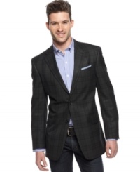 This dark slim fit blazer from Tommy Hilfiger adds to your nighttime allure with modern sizing and style. This dark slim fit blazer from Tommy Hilfiger adds to your nighttime allure with modern sizing and style.