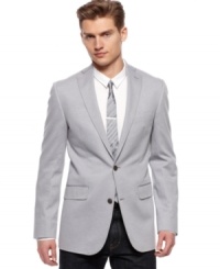 Set your 9-to-5 style apart from the pack in this sharp Calvin Klein slim fit blazer. Set your 9-to-5 style apart from the pack in this sharp Calvin Klein slim fit blazer.