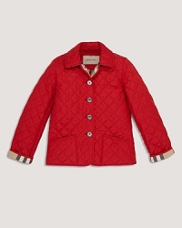 A cozy quilted jacket with a check lined collar and button front. A cozy quilted jacket with a check lined collar and button front.