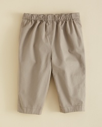Burberry's Darcy pant does double duty, reversing from solid to check and back again. Burberry's Darcy pant does double duty, reversing from solid to check and back again.