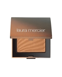 Laura Mercier Bronzed Pressed Powder is a silky smooth bronzing powder that glides on evenly, giving the skin a soft luminosity and healthy, sunny glow without looking unnatural or heavy. The velvet composition adheres to the skin providing longer wear while special pigments blend evenly into the skin. Oil-free, mistake-proof application provides the perfect back to beach look. Laura Mercier Bronzed Pressed Powder is a silky smooth bronzing powder that glides on evenly, giving the skin a soft luminosity and healthy, sunny glow without looking unnatural or heavy. The velvet composition adheres to the skin providing longer wear while special pigments blend evenly into the skin. Oil-free, mistake-proof application provides the perfect back to beach look.