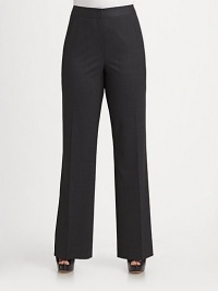 Chic, tailored design in rich wool with just a hint of stretch for a modern fit.Midrise waistband with concealed button closure Zipper fly Flat front Back darts for shaping Inseam, about 33 96% virgin wool/4% elastane Dry clean Imported Chic, tailored design in rich wool with just a hint of stretch for a modern fit.Midrise waistband with concealed button closure Zipper fly Flat front Back darts for shaping Inseam, about 33 96% virgin wool/4% elastane Dry clean Imported