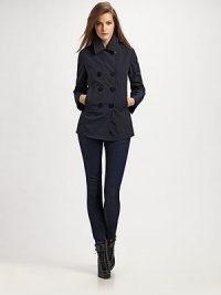 Classic double-breasted styling in crisp, lightweight canvas.Foldover collar Button front Welt pockets Back yoke Inverted back pleat Polyester; dry clean Imported Classic double-breasted styling in crisp, lightweight canvas.Foldover collar Button front Welt pockets Back yoke Inverted back pleat Polyester; dry clean Imported