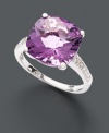 Indulge in the cocktail hour trend with this chic ring. A brilliant cushion-cut pink amethyst (6 ct. t.w.) draws plenty of attention in its 14k white gold setting with two matching rows of sparkling diamond side accents.
