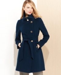 Luxe goldtone buttons highlight the tailored, asymmetrical style of Tahari's wool-blend coat. The belt is a waist-defining detail that beautifully cinches the silhouette. Luxe goldtone buttons highlight the tailored, asymmetrical style of Tahari's wool-blend coat. The belt is a waist-defining detail that beautifully cinches the silhouette.