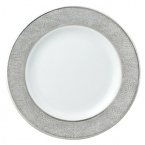 Sauvage bread and butter plate by Bernadaud successfully blends three surprisingly sensual touches - pearl-grey lizard skin, silver filament and interlocking Cordovan honeycombs -- into one truly memorable collection for your table. Exceptional elegance with a touch of the exotic.