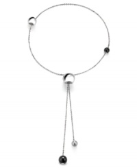 Simple and sophisticated. Add a modern edge to your style with Breil's Chaos lariat necklace. Featuring adjustable spheres, it's made in silver tone stainless steel with natural black stones. Approximate length: 28 inches. Simple and sophisticated. Add a modern edge to your style with Breil's Chaos lariat necklace. Featuring adjustable spheres, it's made in silver tone stainless steel with natural black stones. Approximate length: 28 inches.