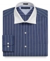 Slim stripes bring eye-catching appeal to this sharp Tommy Hilfiger dress shirt.