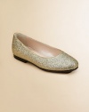Dazzling spandex is adorned with glitter and designed in a classic slip-on silhouette.Slip-onSpandex upperLeather liningRubber solePadded insoleImported