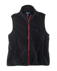 An essential vest is crafted from plush Polarfleece® for an ultra-soft feel and a cozy look. An essential vest is crafted from plush Polarfleece® for an ultra-soft feel and a cozy look.