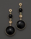 Sparkling diamonds highlight these drop earrings in bold black enamel and 18K yellow gold.