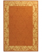 Safavieh takes classic beauty outside of the home with this elegant rug, created with a specially designed sisal weave. In a vibrant terracotta hue with natural accents, this beautiful piece makes the most of any outdoor patio, porch or balcony.