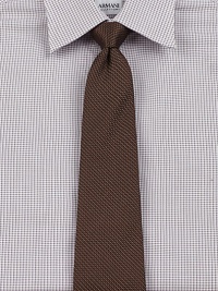 Fine craftsmanship and attention to detail for the power player in the boardroom and beyond.About 3 wideSilkDry cleanMade in Italy Fine craftsmanship and attention to detail for the power player in the boardroom and beyond.About 3 wideSilkDry cleanMade in Italy