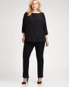 A luxurious style made from matte silk and featuring elegant embellishments. Pair this relaxed-fit blouse with slim-fitting pants or skinny jeans.Round neckCold shouldersEmbellishments along three-quarter sleevesPull-on styleSide slitsAbout 24 from shoulder to hemSilkDry cleanImported