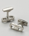 Salvatore Ferragamo classic double Gancini cuff links. Classic double Gancini cuff links with Ferragamo etched in the center.