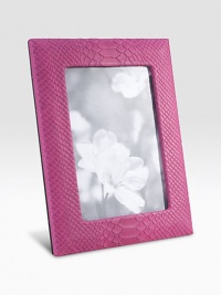 Display your memories in this handmade frame, wrapped in python-embossed leather with sturdy metal easel and convenient rear drop-down door for easy access.LeatherMade in USA DIMENSION INFORMATION 4 X 65 X 7 Display your memories in this handmade frame, wrapped in python-embossed leather with sturdy metal easel and convenient rear drop-down door for easy access.LeatherMade in USA DIMENSION INFORMATION 4 X 65 X 7