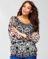INC's plus size peasant top updates a soft silhouette with a bold ikat print for an appealing anytime casual look.