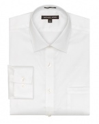 Long sleeve, non-iron solid shirt. A regular fitting, button front dress shirt with spread collar and adjustable barrel cuffs. Chest pocket at left chest.