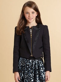 A tux deluxe for your little lass, complete with a swallowtail hem.Jewel necklineZip frontSatin-edged peaked lapelsSatin-piped welt pocketsLong sleeves with button detailed cuffsButtoned belt at back waistCotton/SpandexDry cleanImported A tux deluxe for your little lass, complete with a swallowtail hem.Jewel necklineZip frontSatin-edged peaked lapelsSatin-piped welt pocketsLong sleeves with button detailed cuffsButtoned belt at back waistCotton/SpandexDry cleanImported