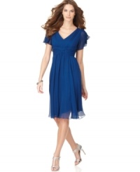 Crafted in gauzy chiffon, this Suzi Chin dress is an effortlessly chic look that flatters your figure. Crafted in gauzy chiffon, this Suzi Chin dress is an effortlessly chic look that flatters your figure.