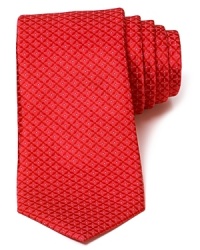 Rich color and a cool, optical pattern define this luxurious silk tie cut in a classic width from the iconic designer Valentino. Rich color and a cool, optical pattern define this luxurious silk tie cut in a classic width from the iconic designer Valentino.