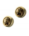 With their rich amber hue, the Colorado crystals in T Tahari's stylish stud earrings are complemented by gold tone mixed metal. Including a bezel setting and logo-embossed design. Approximate diameter: 1/2 inch.