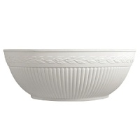 Edme serving bowl by Wedgwood. Wedgwood marks the 100th anniversary of its classic Edme collection with a refreshing update of its timeless pattern. A new antique white glaze enhances the elegant colannade embossment and laurel motif accent pieces. Sophisticated shapes and generously sized pieces make this pattern ideal for today's lifestyle. Edme serving bowl by Wedgwood. Wedgwood marks the 100th anniversary of its classic Edme collection with a refreshing update of its timeless pattern. A new antique white glaze enhances the elegant colannade embossment and laurel motif accent pieces. Sophisticated shapes and generously sized pieces make this pattern ideal for today's lifestyle.