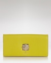 kate spade new york's ever-chic wallet gets prettier in luxurious leather with a bold turnlock closure. Equal parts practical and playful, it's perfect companion for purse or palm.