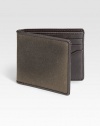 A classic water resistant fabric, waxwear acquires a beautiful patina with age and use. French-edged with leather, this bill holder mixes utilitarian and luxe materials to create a uniquely masculine wallet.One billfold compartmentSix card slotsWaxed cotton/leather4W x 4HImported